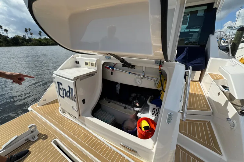 Slide: The Image of 2016 Tiara Yachts C44 Coupe with open storage compartment on deck. - 94