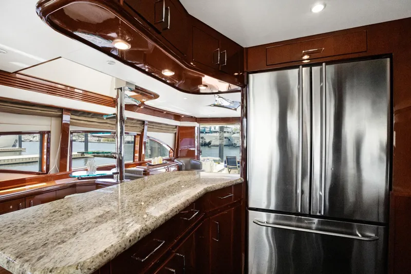 Slide: The Image of Luxurious 2008 Marquis 690 yacht kitchen with granite countertops and stainless steel appliances. - 15