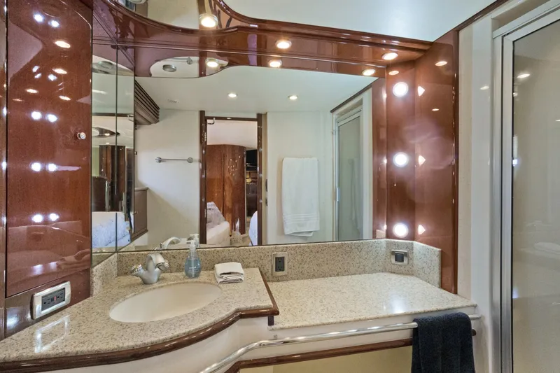 Slide: The Image of Luxurious bathroom in 2008 Marquis 690 yacht with elegant lighting and modern fixtures. - 30