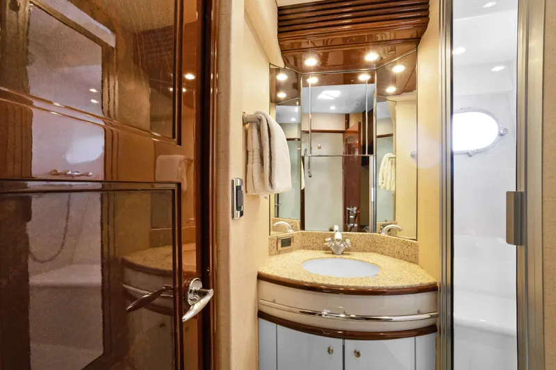 Slide: The Image of Luxurious bathroom interior of 2008 Marquis 690 yacht with elegant fixtures and lighting. - 32