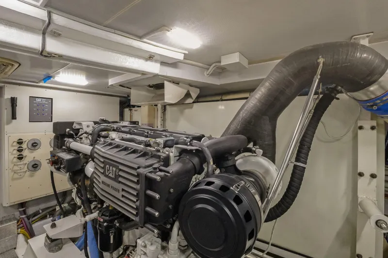 Slide: The Image of Engine room of 2008 Marquis 690 yacht with CAT marine power engine. - 58