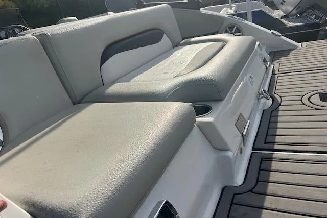 Slide: The Image of 2016 Starcraft Crossover 231 SCX IO SURF boat interior with cushioned seating. - 7