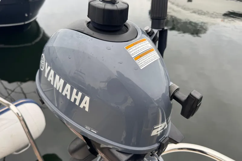 Slide: The Image of 2024 Ranger Tugs R-29 S control panel with thruster and electrical switches. - 20