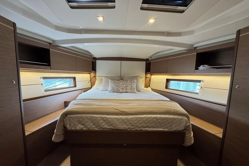 Slide: The Image of Luxurious cabin interior of 2022 Beneteau Oceanis 46.1 yacht with cozy bed and modern design. - 10
