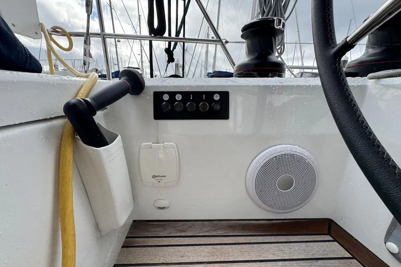 Slide: The Image of Cockpit of 2022 Beneteau Oceanis 46.1 yacht with controls and speaker. - 50