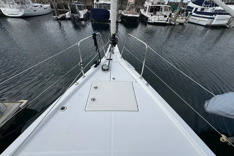 Slide: The Image of Bow view of 2022 Beneteau Oceanis 46.1 yacht docked in a marina. - 57