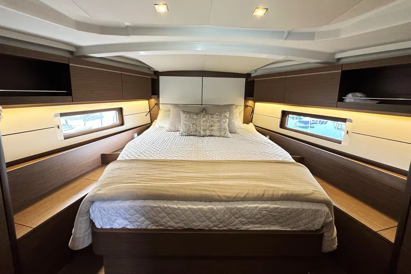 Slide: The Image of Luxurious cabin interior of 2022 Beneteau Oceanis 46.1 yacht with elegant bedding. - 61