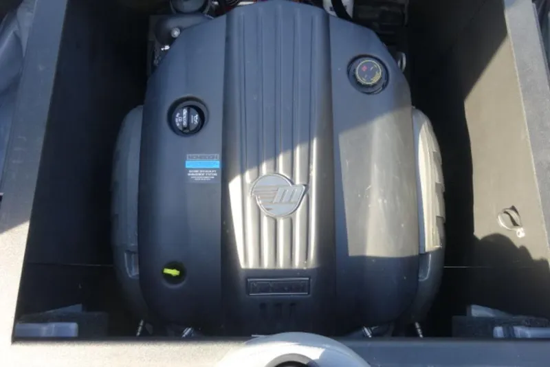 Slide: The Image of 2022 Axis T23 engine compartment with visible components and branding. - 10