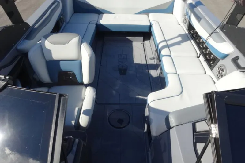 Slide: The Image of 2022 Axis T23 boat interior with spacious seating and modern design. - 14