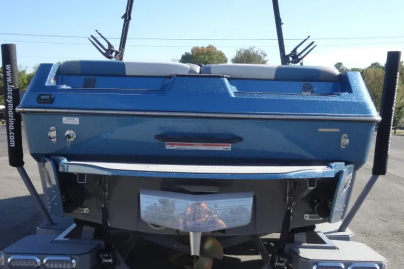 Slide: The Image of 2022 Axis T23 boat rear view, showcasing sleek design and modern features. - 2