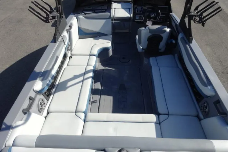 Slide: The Image of 2022 Axis T23 boat interior with spacious seating and modern design. - 4