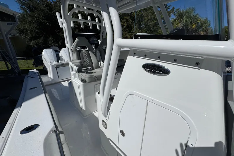 Slide: The Image of 2026 Cape Horn 34 XS boat interior with seating and console details. - 22