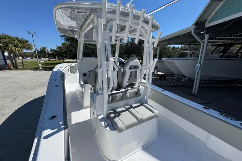 Slide: The Image of 2026 Cape Horn 34 XS boat interior with seating and rod holders. - 31