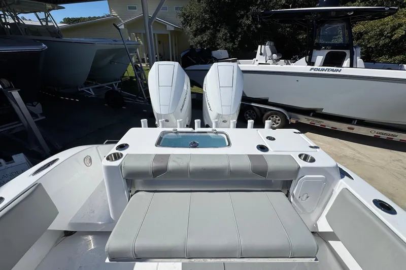 Slide: The Image of 2026 Cape Horn 34 XS boat interior with seating and Mercury engines. - 36