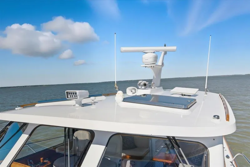 Slide: The Image of 2015 Hinckley Talaria 43 yacht roof with radar, cruising on open water. - 22
