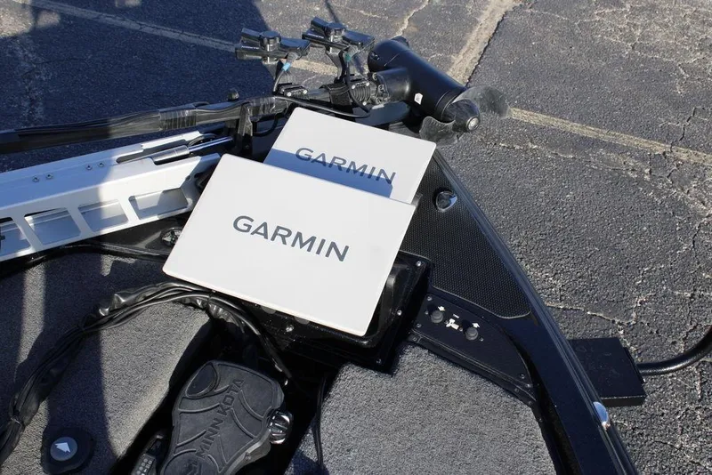 Slide: The Image of 2025 Phoenix 921 ELITE boat with Garmin electronics on deck. - 15