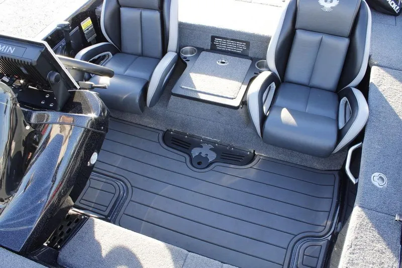 Slide: The Image of 2025 Phoenix 921 ELITE boat interior with dual seats and steering console. - 29