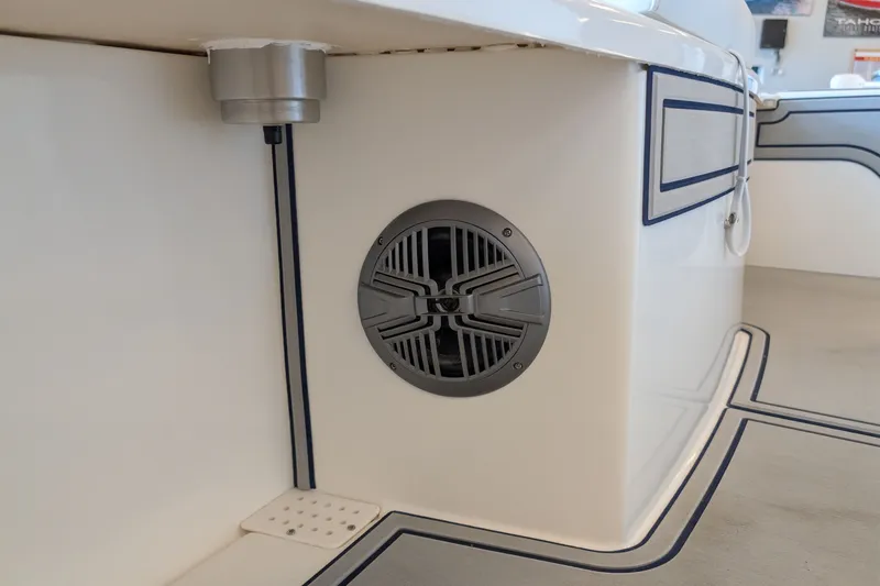 Slide: The Image of 2026 Mako 18 Pro Skiff Patriot Edition interior with speaker detail. - 8