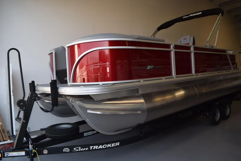 The Image of 2026 Sun Tracker Party Barge 22 RF XP3 pontoon boat in showroom. - 0