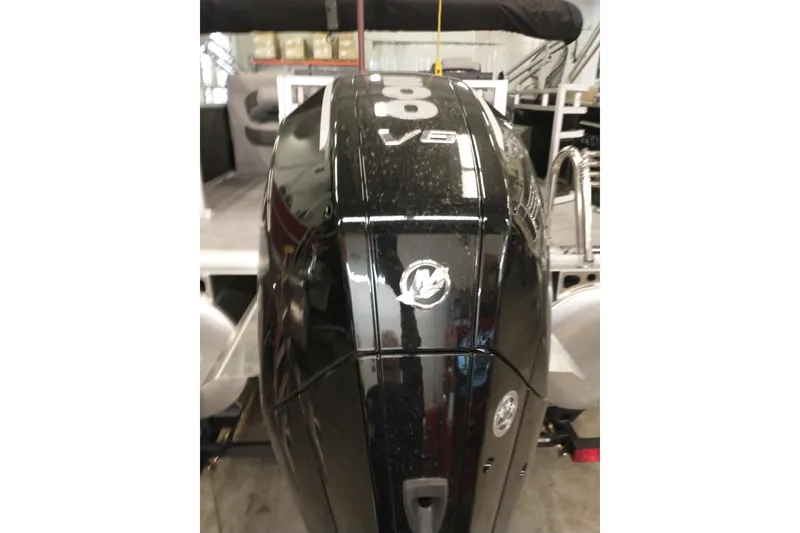 Slide: The Image of 2026 Sun Tracker SportFish 22 XP3 interior with seating and storage area. - 3