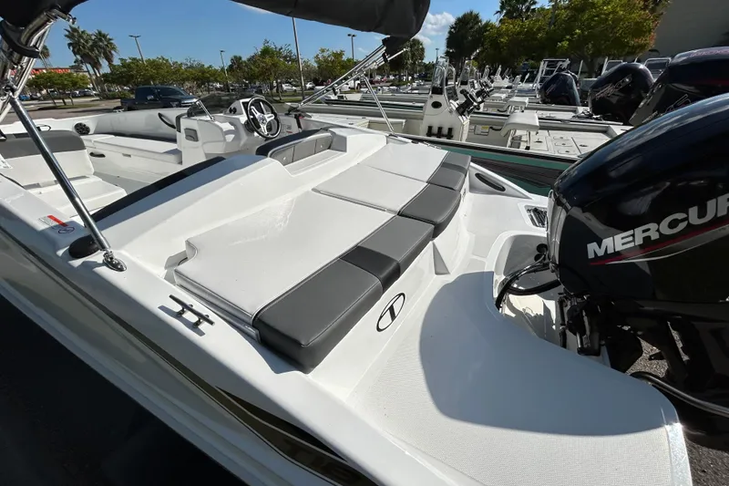 Slide: The Image of 2026 Tahoe T18 boat with Mercury engine, featuring sleek seating and modern design. - 5