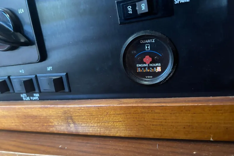 Slide: The Image of Control panel of a 1993 Ocean Yachts 44 Aft Cabin showing engine hours. - 30