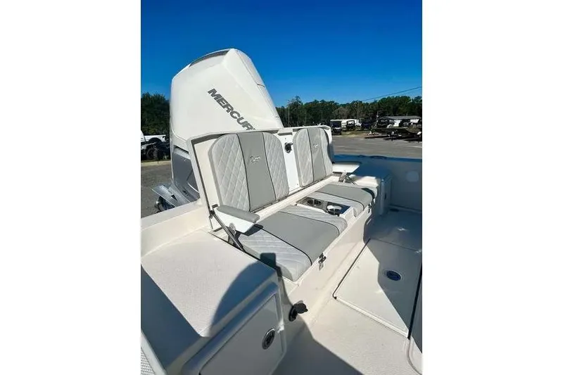 Slide: The Image of 2026 Ranger 2360 Bay boat with Mercury engine, featuring comfortable seating and sleek design. - 18