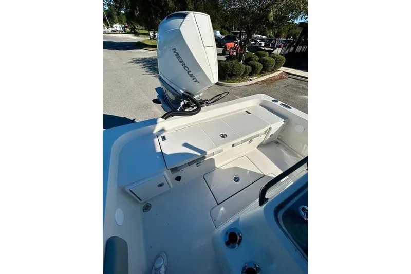 Slide: The Image of 2026 Ranger 2360 Bay boat with Mercury engine, rear deck view. - 19