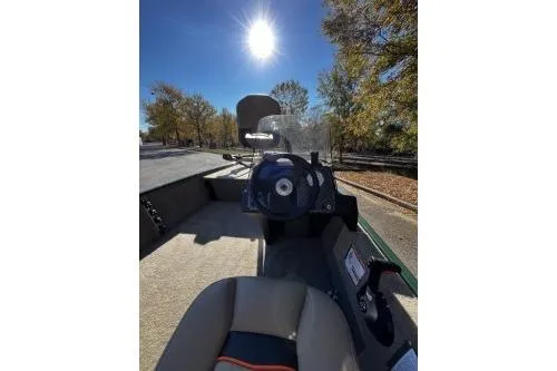 Slide: The Image of 2026 Tracker Bass Tracker Classic Limited boat interior under sunny sky. - 5