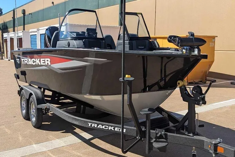 Slide: The Image of 2026 Tracker Targa V-19 Combo boat interior layout, featuring seating and storage compartments. - 6