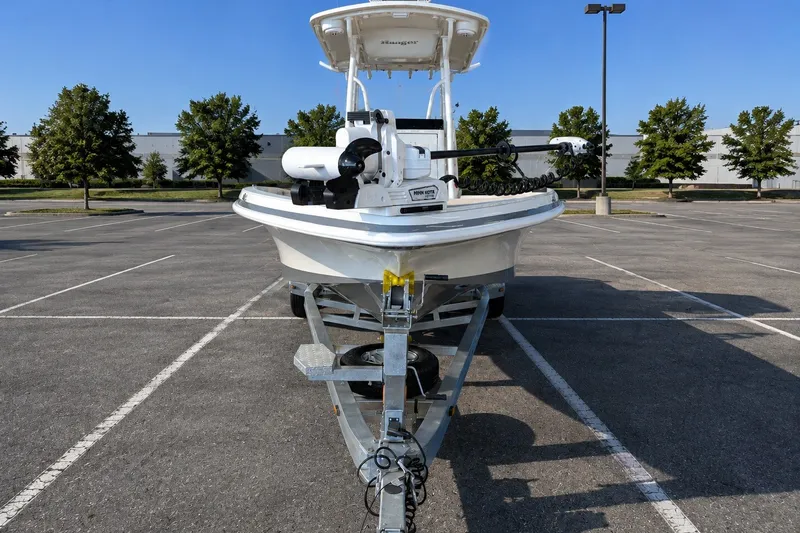 Slide: The Image of 2026 Ranger 2510 Bay boat on trailer in parking lot, front view. - 11