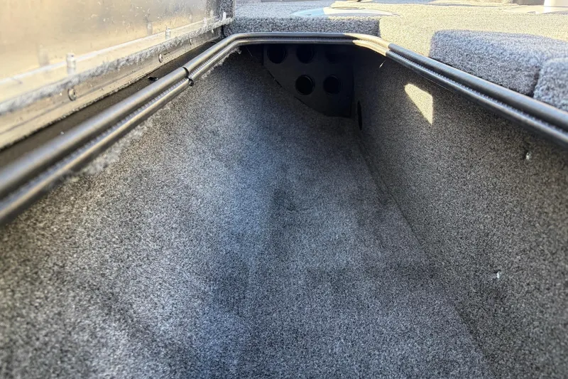 Slide: The Image of Interior view of 2026 Tracker Pro Team 175 Crappie Edition boat storage compartment. - 13