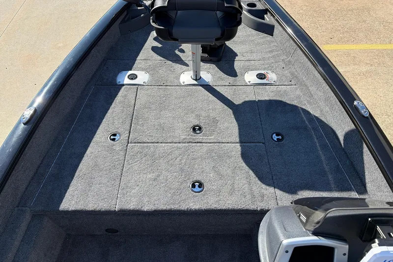 Slide: The Image of 2026 Tracker Pro Team 175 Crappie Edition boat interior with seating and storage compartments. - 14