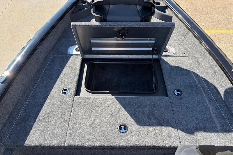 Slide: The Image of 2026 Tracker Pro Team 175 Crappie Edition boat with open storage compartment. - 15