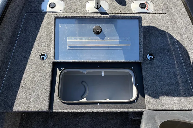 Slide: The Image of 2026 Tracker Pro Team 175 Crappie Edition boat interior with storage compartment. - 20