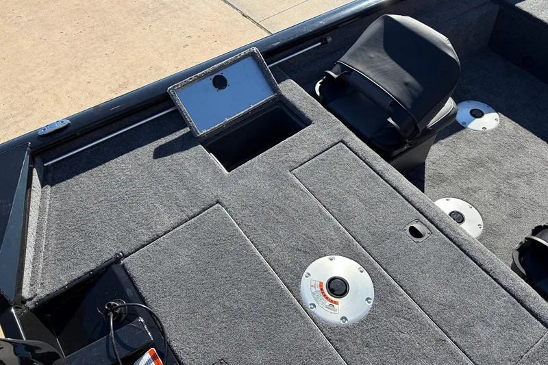 Slide: The Image of 2026 Tracker Pro Team 175 Crappie Edition boat interior with seating and storage compartments. - 30