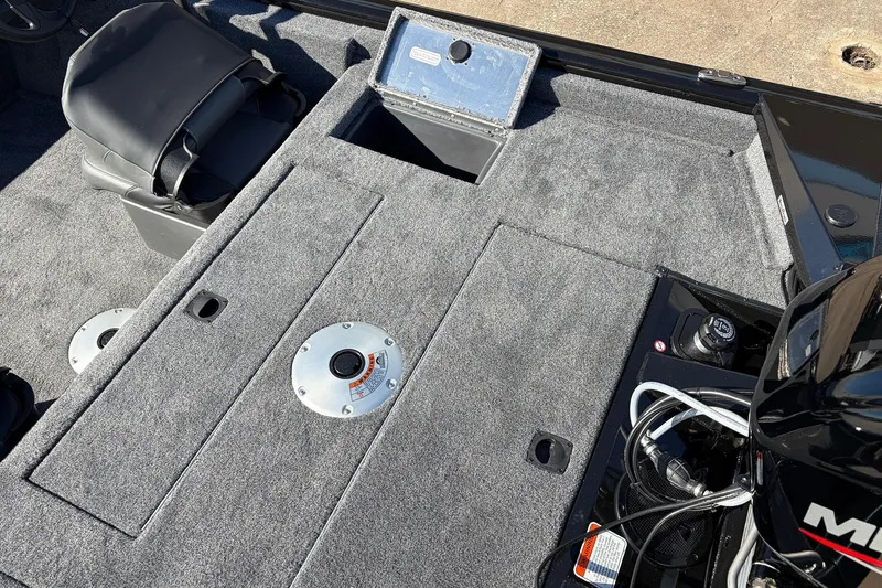 Slide: The Image of 2026 Tracker Pro Team 175 Crappie Edition boat interior with storage compartments and seating. - 33