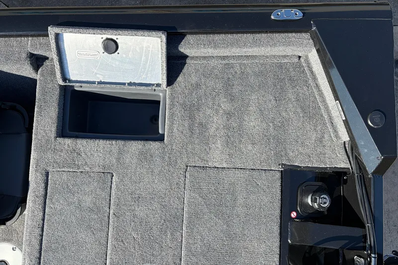 Slide: The Image of 2026 Tracker Pro Team 175 Crappie Edition boat interior with storage compartment. - 34