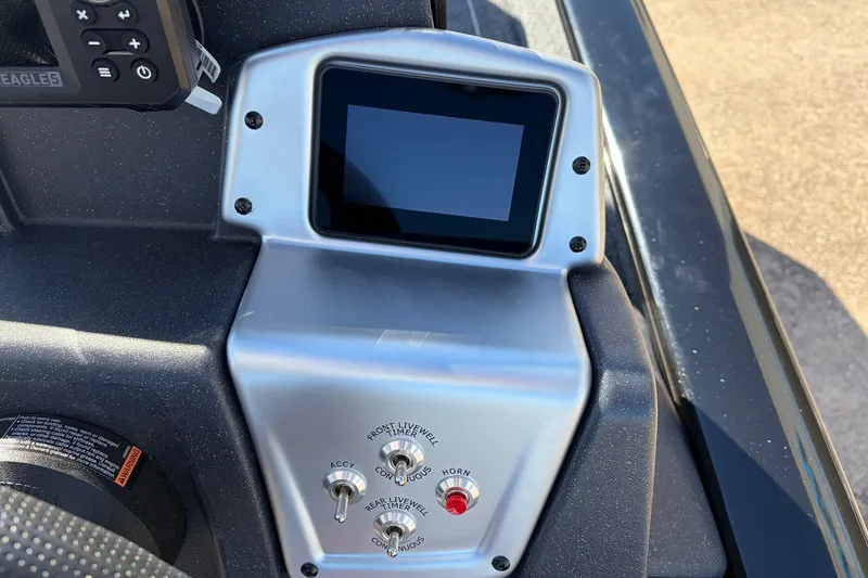 Slide: The Image of Control panel of 2026 Tracker Pro Team 175 Crappie Edition boat with screen and switches. - 38