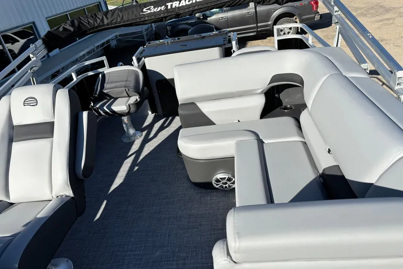 Slide: The Image of 2026 Sun Tracker SportFish 22 XP3 pontoon boat with spacious seating and modern design. - 10