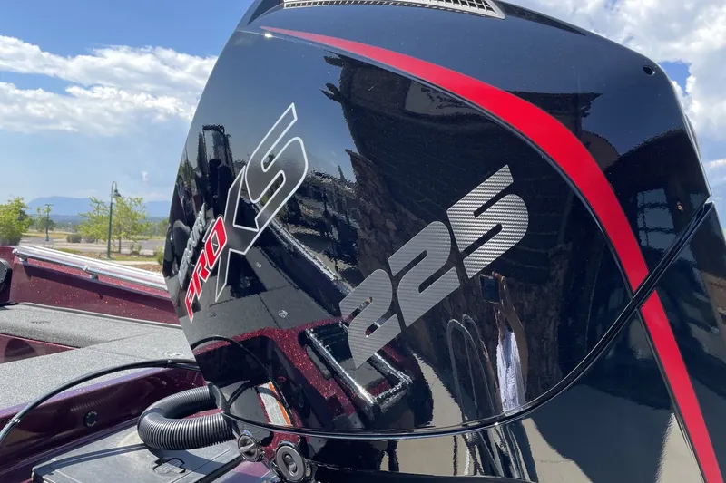 Slide: The Image of Nitro ZV20 Pro 2026 boat engine, Pro XS 225, outdoors under blue sky. - 4