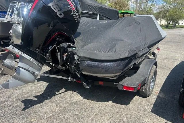 Slide: The Image of Covered Nitro Z18 Pro boat on trailer, featuring a powerful outboard motor, 2026 model. - 94