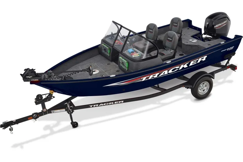 Slide: The Image of 2026 Tracker Pro Guide V-16 WT boat in parking lot, side view. - 3