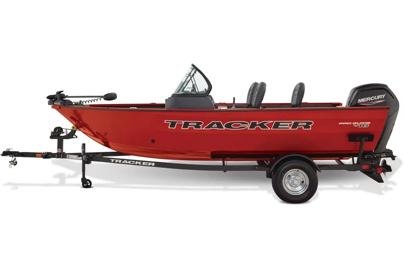 Slide: The Image of 2026 Tracker Pro Guide V-16 WT boat on trailer with Minn Kota motor, price tag visible. - 5