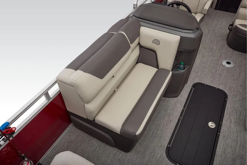 Slide: The Image of Interior seating with cup holders on 2026 Sun Tracker Fishin' Barge 22 XP3. - 31
