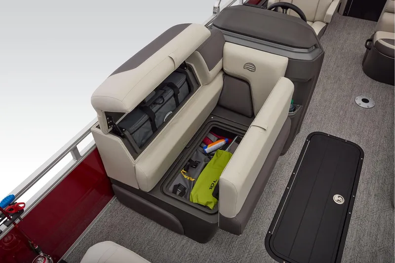 Slide: The Image of 2026 Sun Tracker Fishin' Barge 22 XP3 interior with steering console and seating. - 32