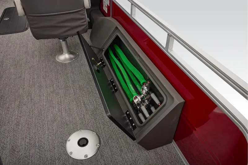 Slide: The Image of Storage compartment of 2026 Sun Tracker Fishin' Barge 22 XP3 boat, open and empty. - 47