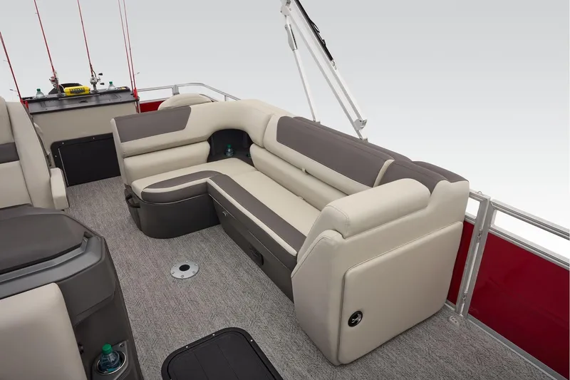 Slide: The Image of 2026 Sun Tracker Fishin' Barge 22 XP3 fishing station with rod holders and storage. - 48