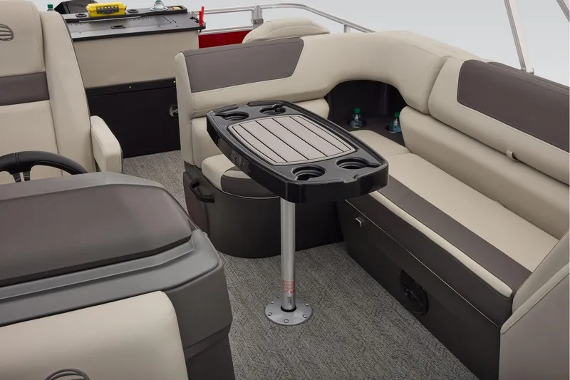 Slide: The Image of 2026 Sun Tracker Fishin' Barge 22 XP3 livewell and motor detail. - 49