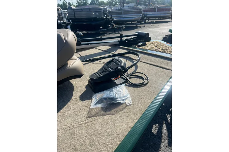 Slide: The Image of 2026 Tracker Bass Tracker Classic Limited boat deck with equipment and seating. - 3